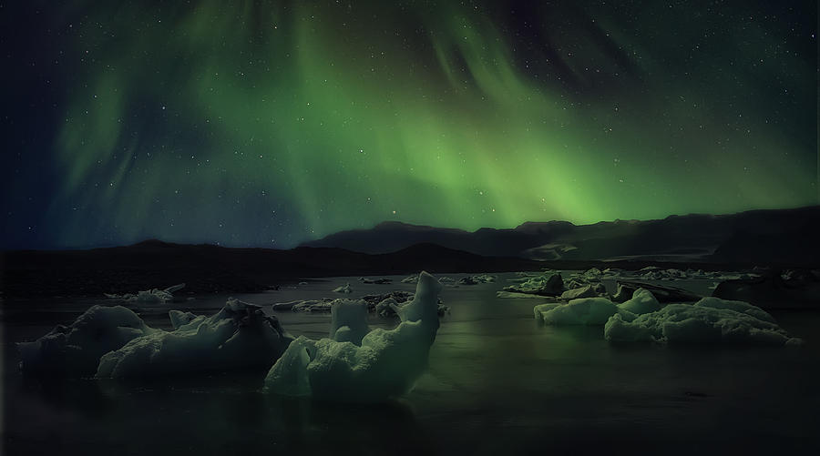 Aurora on Ice Photograph by Wade Aiken