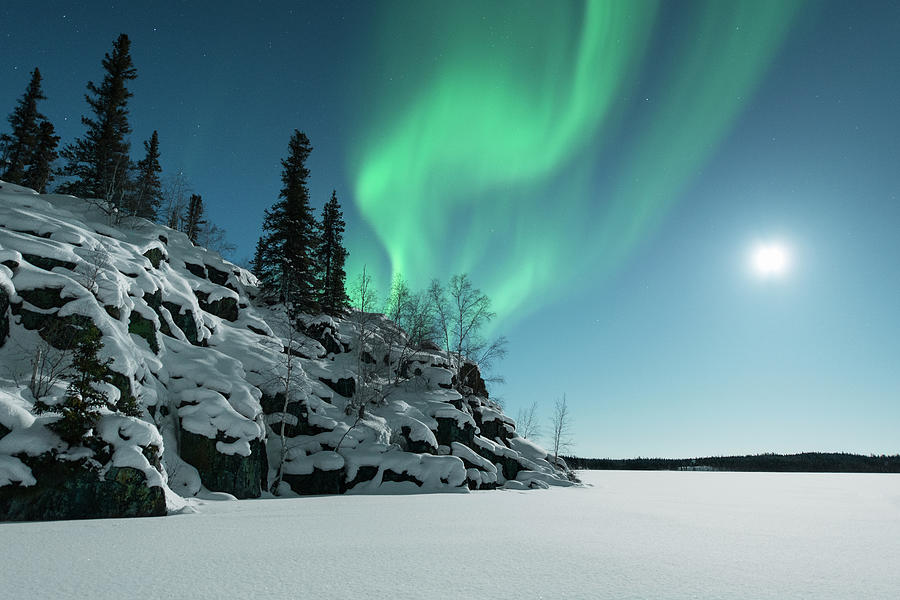 Aurora Over Small Snow Covered Hill Photograph by Michael Ericsson