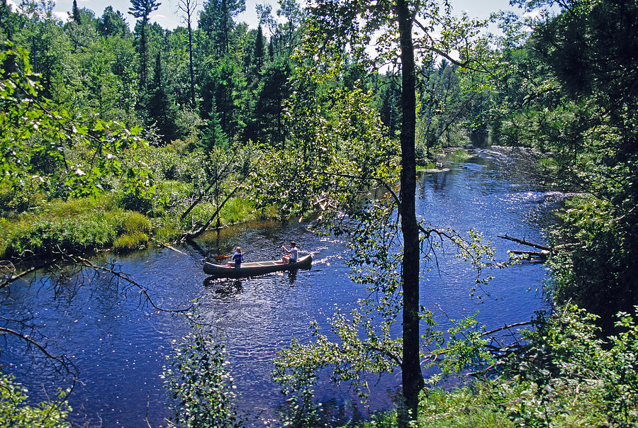 AuSable River canoe Photograph by Dennis Cox