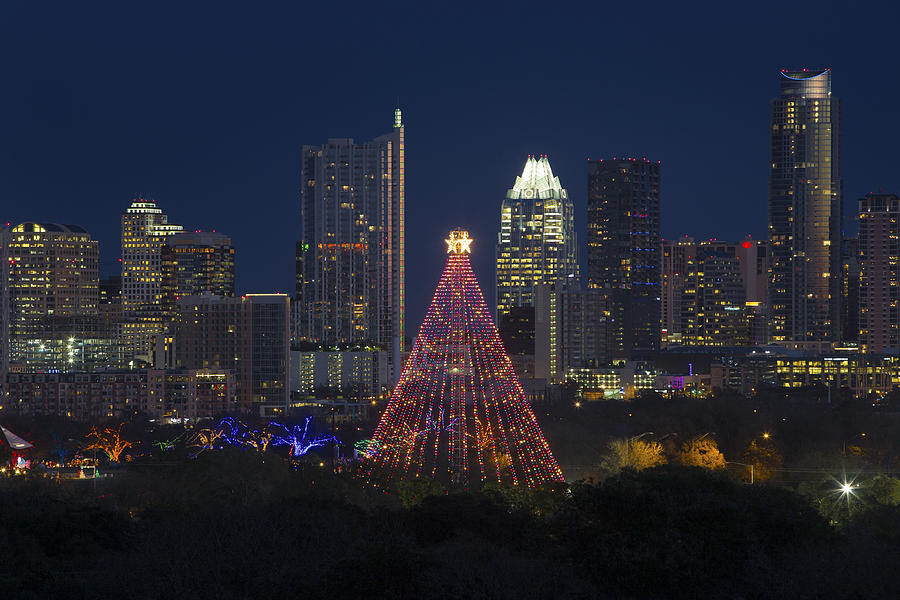 Zilker Park Christmas Tree Photograph - Trail of Lights and the Austin Skyline at Christmas by Rob Greebon