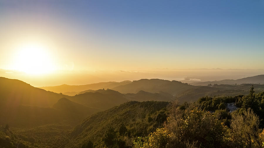 Australia, Queensland, sunrise above the ocean seen from mountains Photograph by Westend61