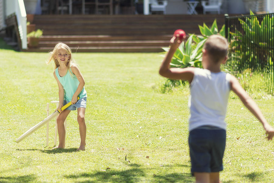 Australian kids playing cricket Photograph by Funky-data