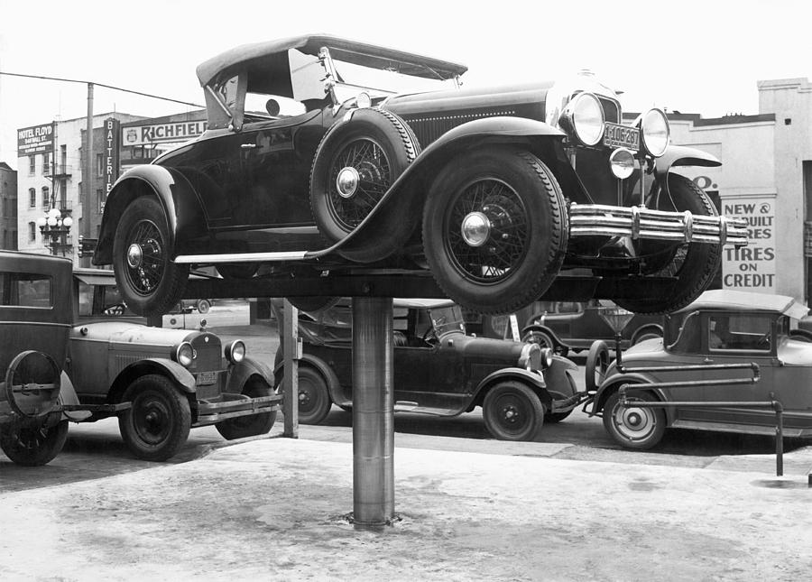 Auto Repair Shop Lift Photograph by Underwood Archives