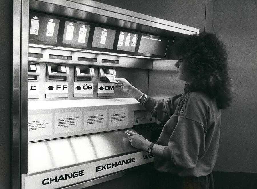 Automatic Money Exchange Photograph by Retro Images Archive