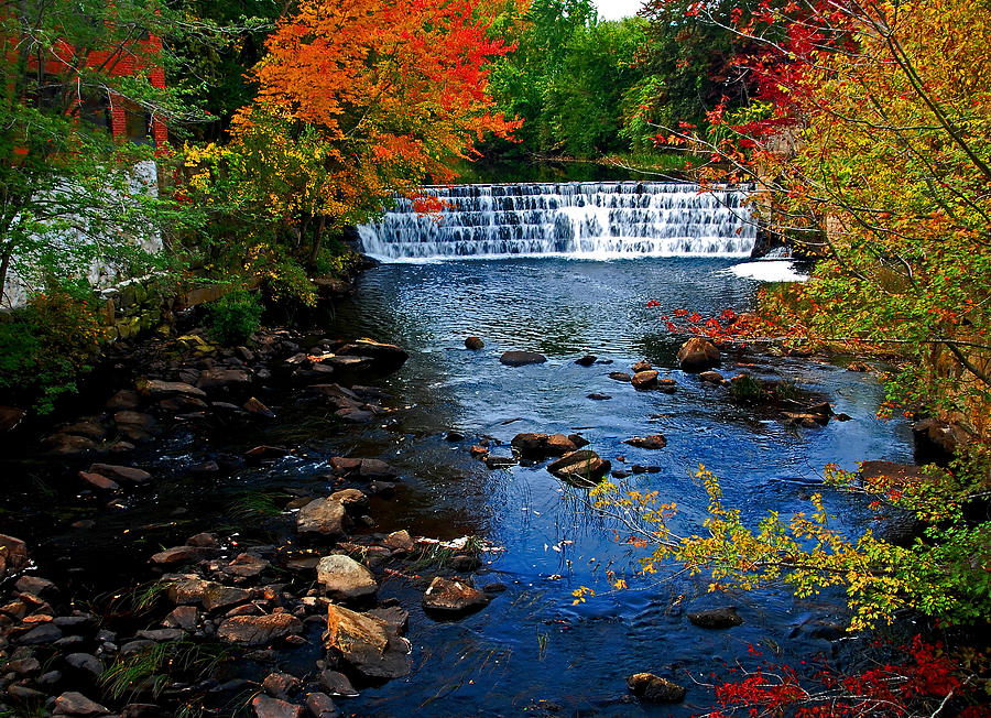 Autumn colors over mill pond falls. Photograph by Bill Jonscher