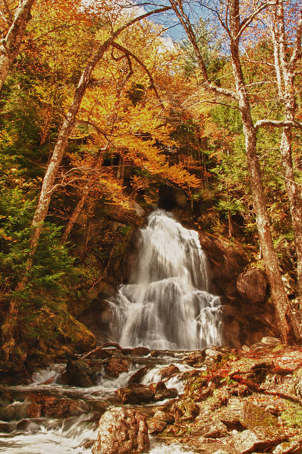 Autumn colors over Moss Glen Falls Photograph by Jeff Folger