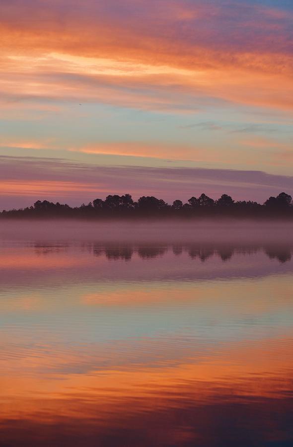 Autumn Sunrise captures the beautiful colors of an Atlantic Coast Sunrise reflected on the bay Photograph by Billy Beck