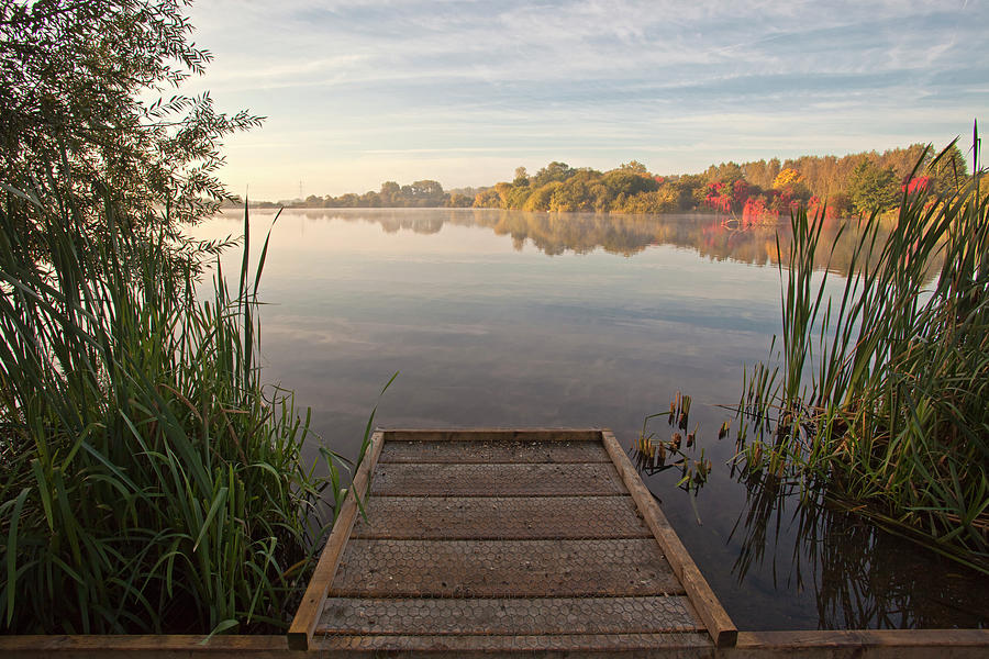 Autumnal Sunrise Across The Lake Photograph by Ray Wise