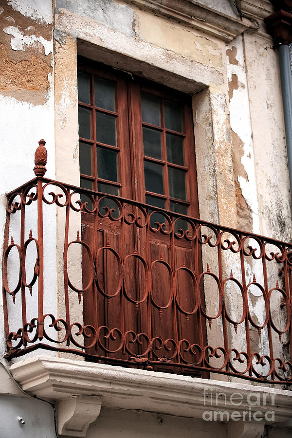 Aveiro Rusty Balcony Photograph by John Rizzuto