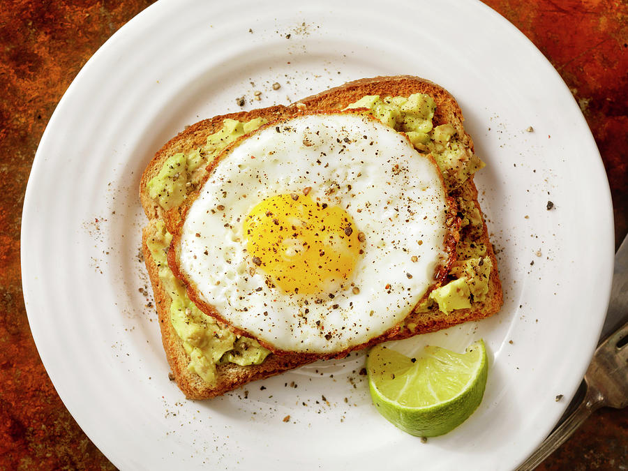 Avocado Toast With A Fried Egg Photograph by Lauripatterson