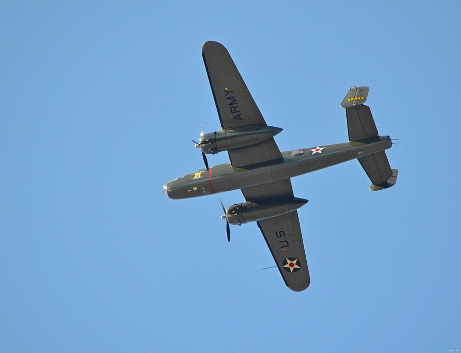 B25 Mitchell WWII Bomber from 70th Anniversary of the Doolittle Raid flies over Florida 21 April 13 Photograph by Jeff at JSJ Photography