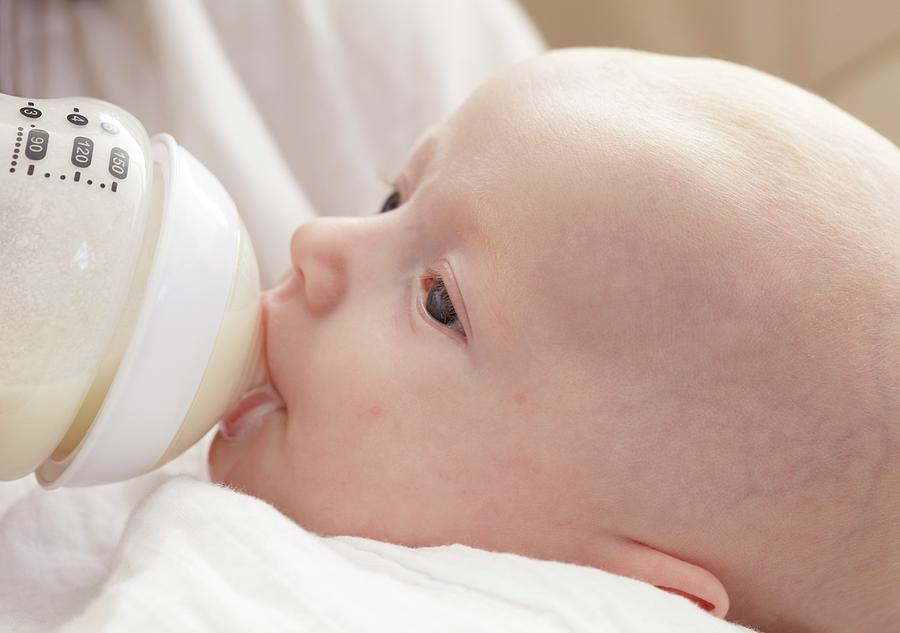 baby-being-bottle-fed-photograph-by-ruth-jenkinson-science-photo