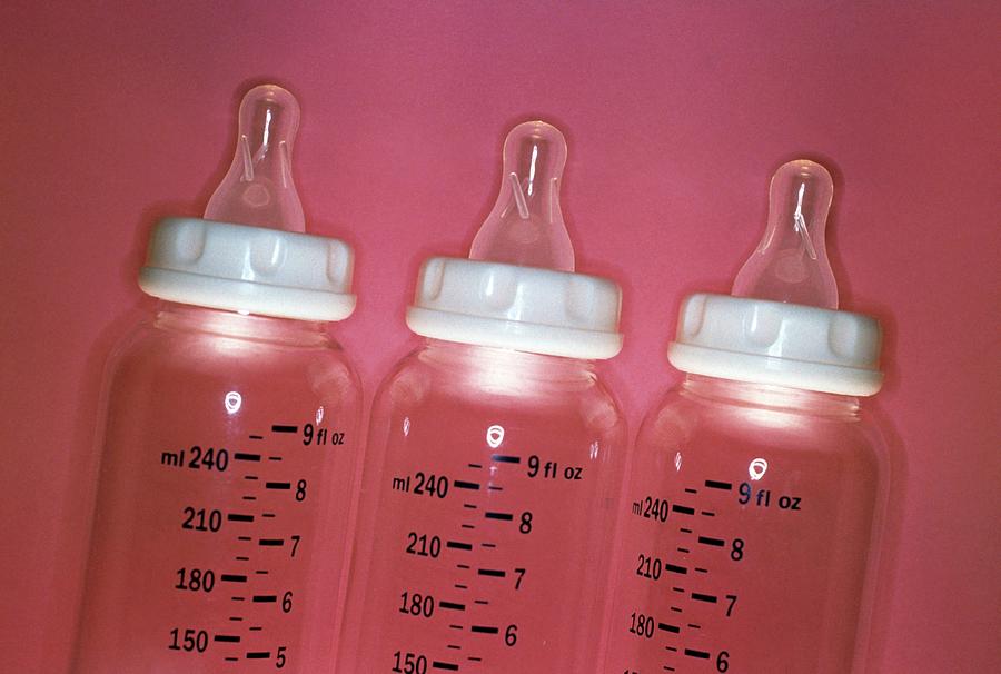 Bottle Photograph - Baby Bottles by Lawrence Lawry/science Photo Library