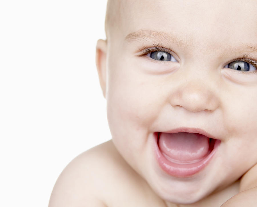 Baby boy (6-9 months) laughing, close up, portrait, studio shot Photograph by Jim Esposito Photography L.L.C.