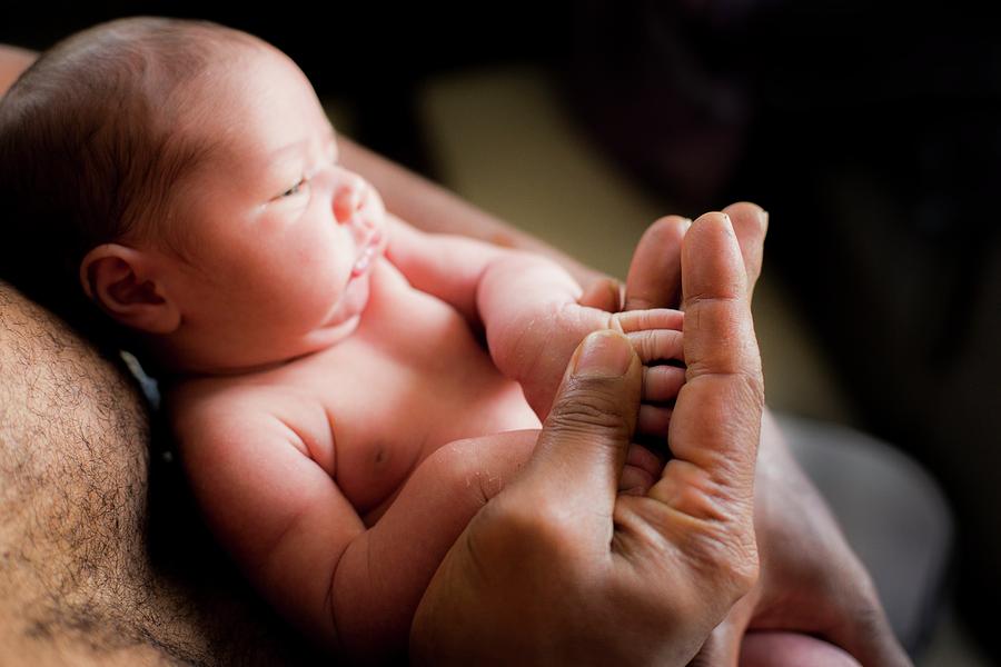 Baby Boy Holding His Fathers Hand Photograph by Samuel Ashfield