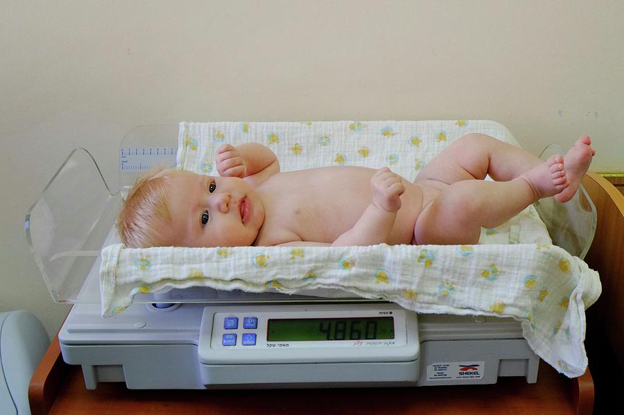 Baby Examined At A Family Health Cente Photograph by Photostock-israel/science Photo Library