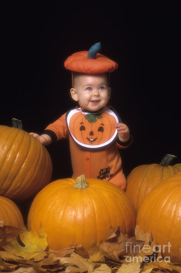 Pumpkin Photograph - Baby in Pumpkin Costume by Jim Corwin