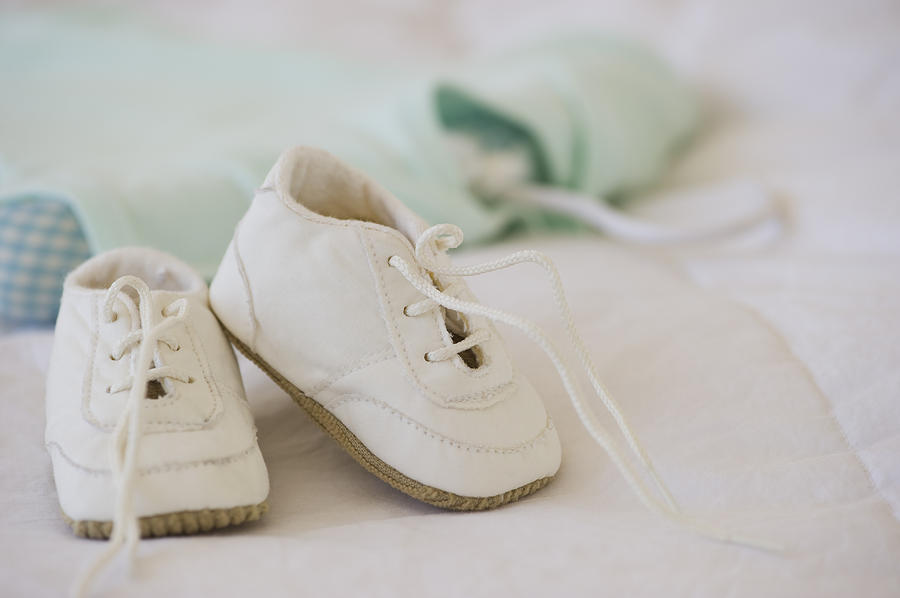 Baby shoes Photograph by Daniel Grill