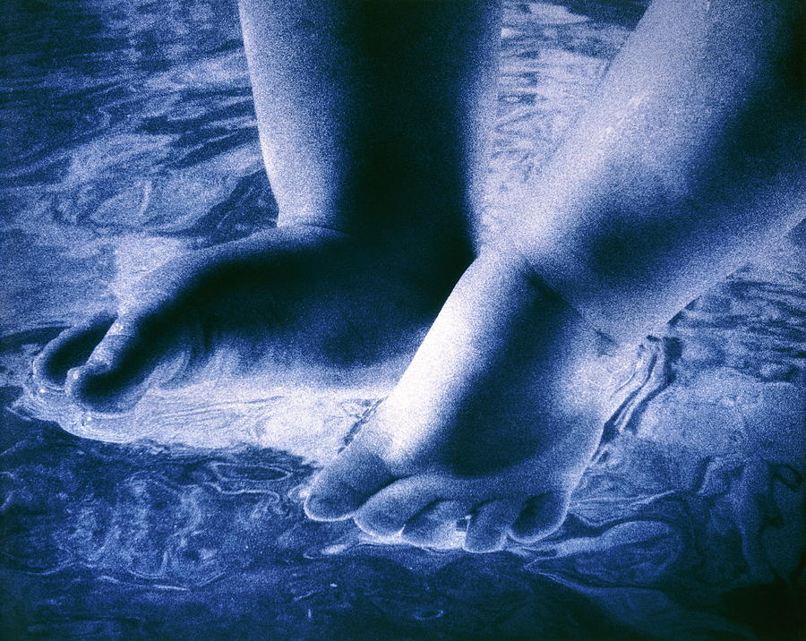 baby-s-feet-in-water-photograph-by-christine-hanscomb-science-photo-library