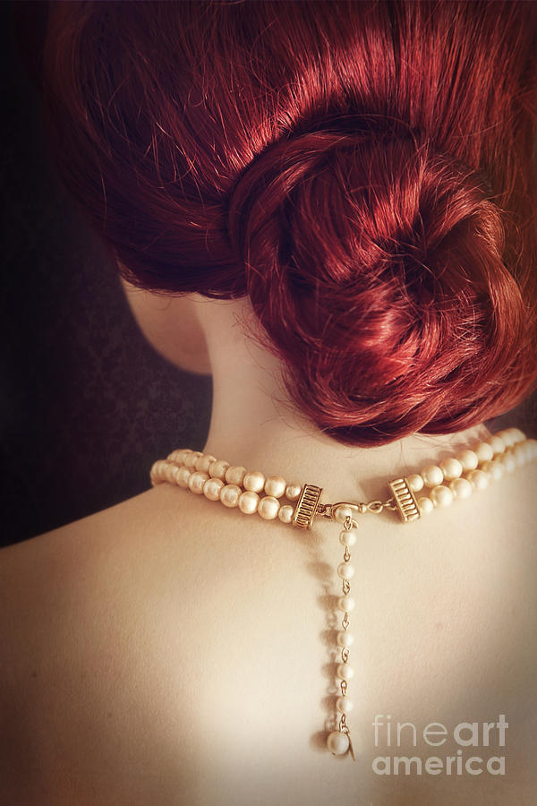 Back view of  woman wearing a pearl necklace Photograph by Sandra Cunningham