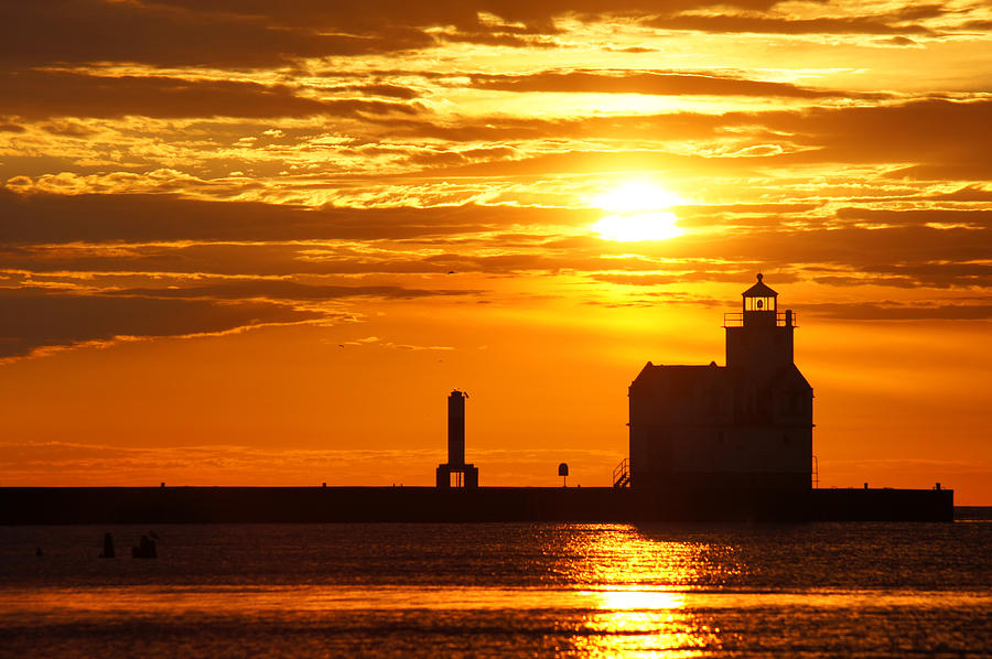 Backlit Lighthouse Photograph by Bill Pevlor