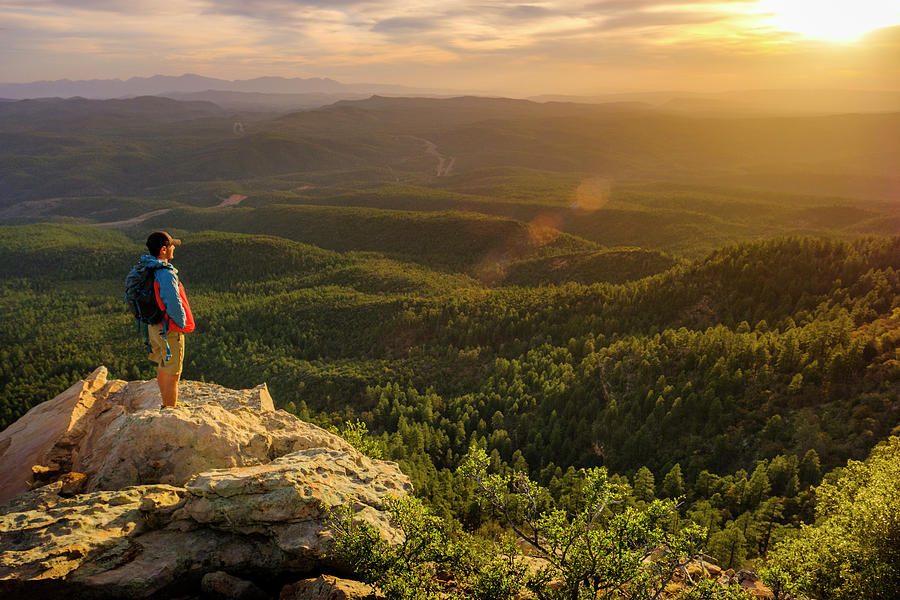 Backpacker Watching Sunset From Cliff Photograph by Kyle Ledeboer - Fine  Art America