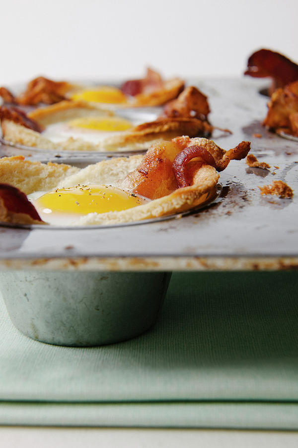 Bacon And Eggs In Muffin Tin Photograph by Karen Beard