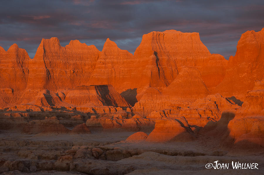 Badlands red rock sunrise Photograph by Joan Wallner
