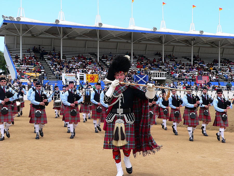 Bagpipe Band and Drum Major Photograph by Jeff Lowe