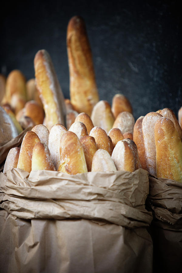 Bags Of Fresh French Bread Photograph By Ron Koeberer