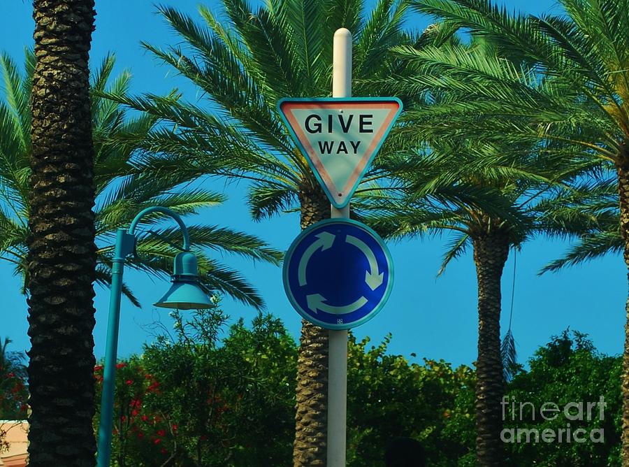 Sign Photograph - Bahamas Traffic Circle Sign by Bob Sample