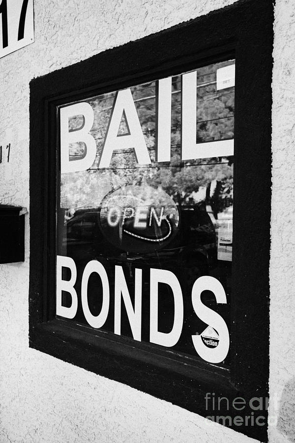 Las Vegas Photograph - bail bonds open sign in a window Las Vegas Nevada USA by Joe Fox