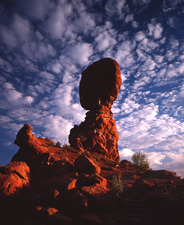 Balanced Rock and Clouds Photograph by Ray Mathis