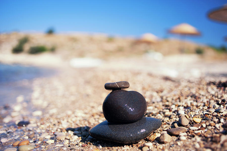 Balanced Stones On The Beach Photograph by Gm Stock Films