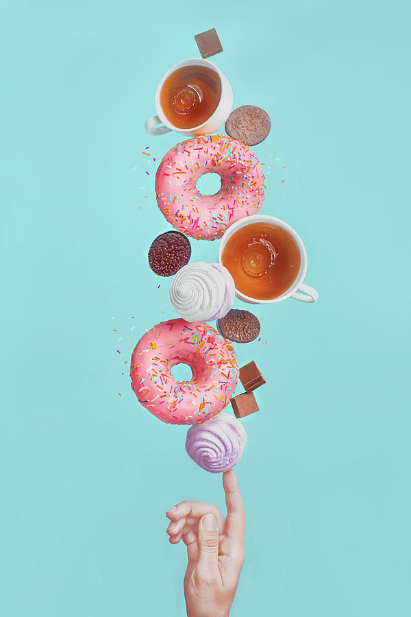 Balancing Donuts Photograph by Dina Belenko Photography