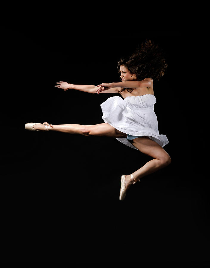 Ballerina Jumping Photograph by Stock colors