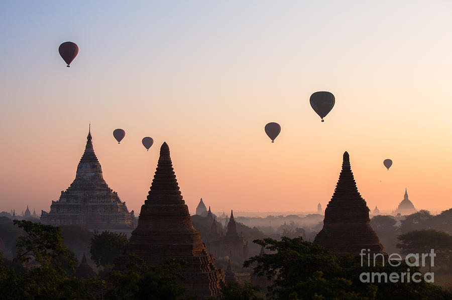 Ballons over the temples of Bagan at sunrise - Myanmar Photograph by Matteo Colombo