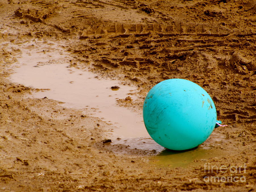 Balloon in Mud Photograph by Chris Bavelles