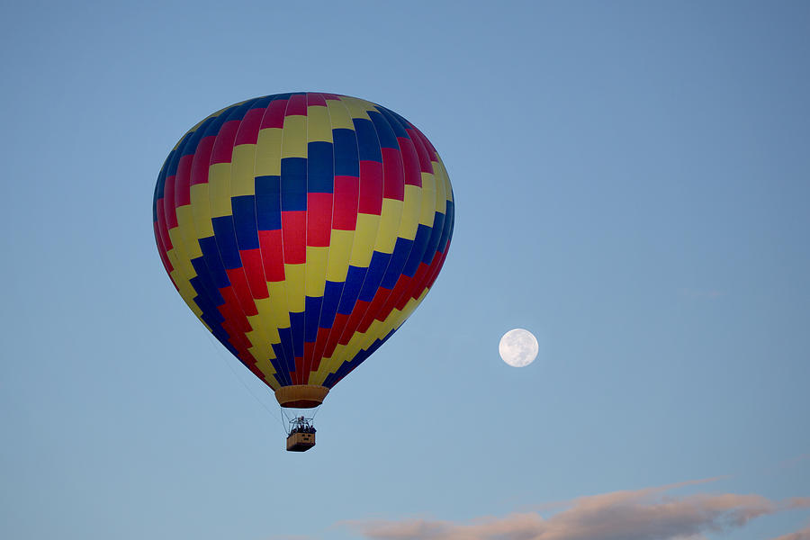 Balloon liftoff with full moon Photograph by Jack Nevitt