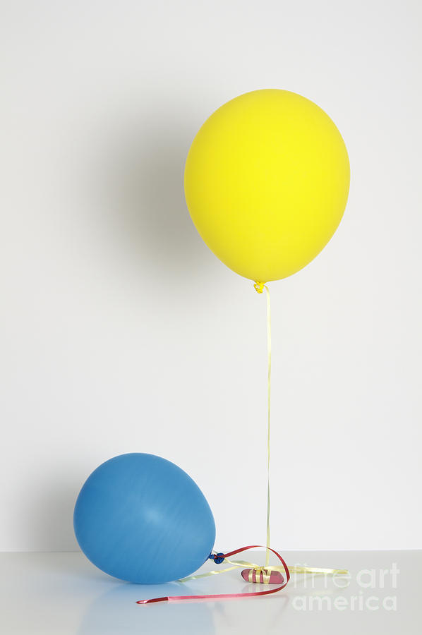 Balloons Filled With Helium And Air Photograph by GIPhotoStock