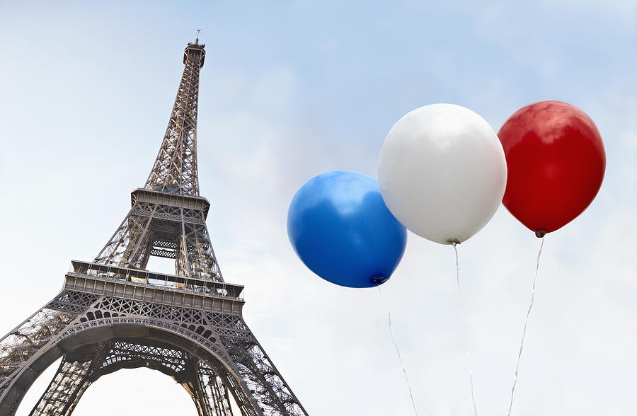 Balloons in the colors of the French flag in front of the Eiffel Tower Photograph by fStop Images - Paul Hudson