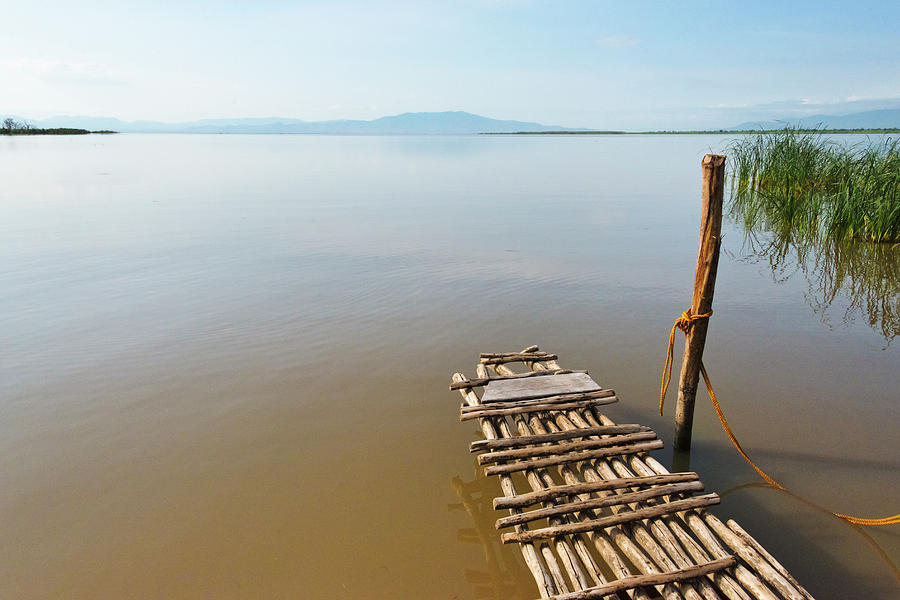 Boat Photograph - Bamboo Raft On Lake Shalla by Keren Su
