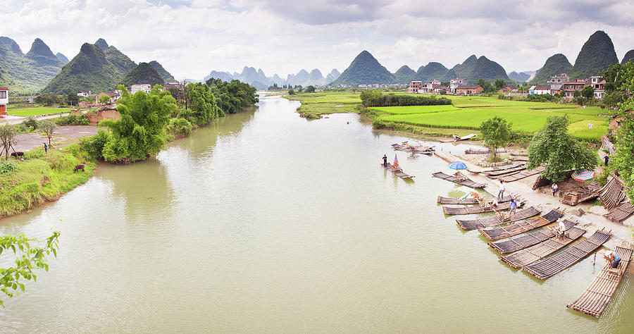 Bamboo Rafts On Banks Of Yulong River Photograph by Shayne Hill Xtreme Visuals Bamboo Rafts On Banks Of Yulong River Photograph by Shayne Hill Xtreme Visuals