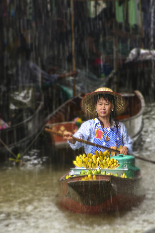 Banana Vendor in the Rain Photograph by Rob Tullis