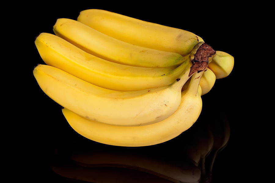 Bananas Photograph by Marek Poplawski