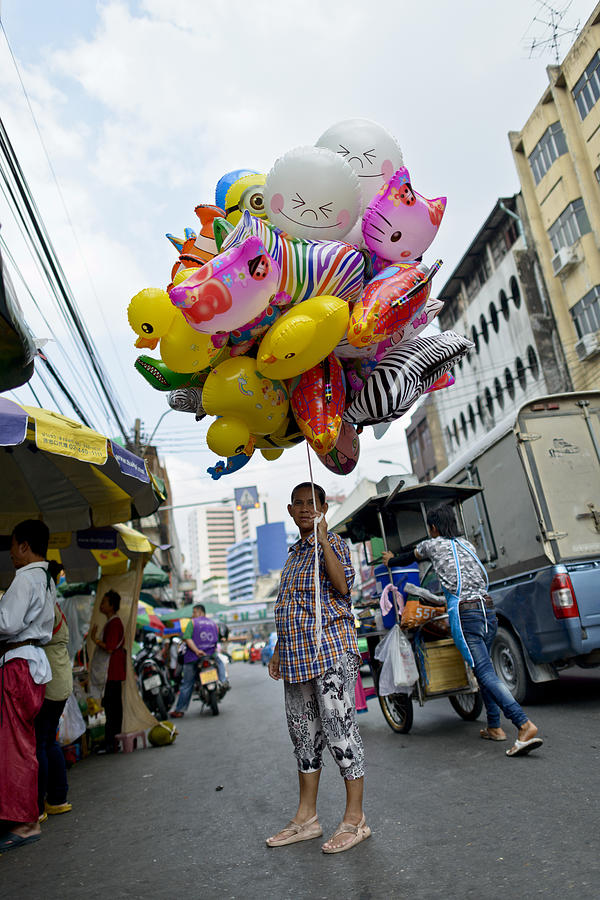Bangkok Balloon Man Photograph by Bob VonDrachek