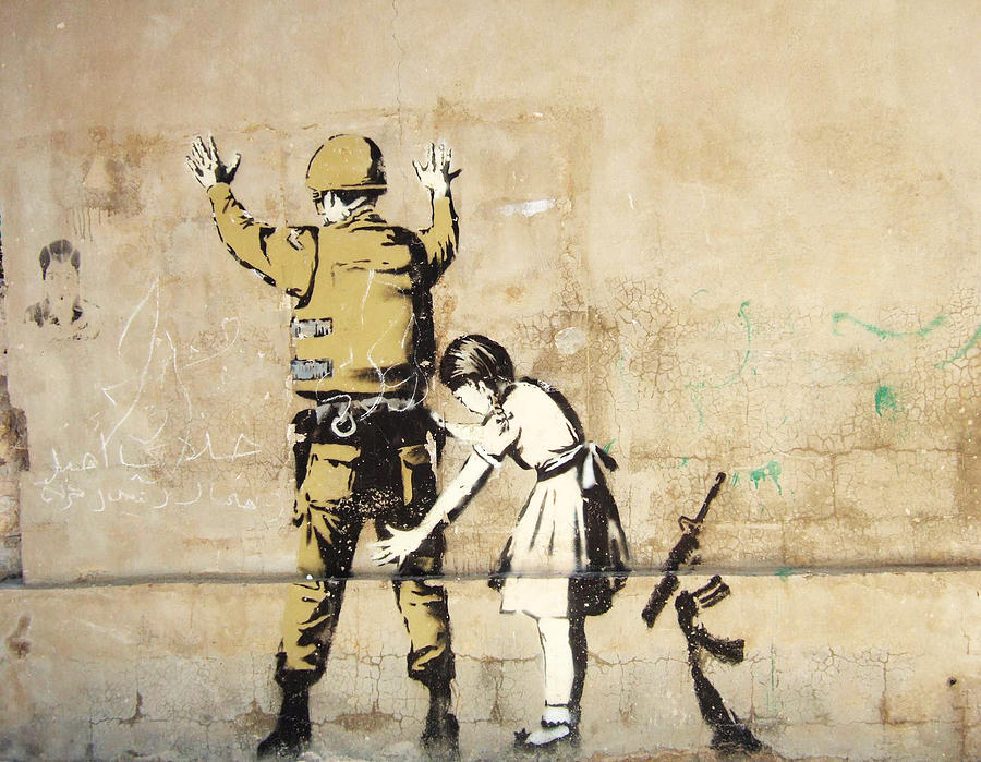 Banksy In West Bank Body Search Photograph by Arik Bennado