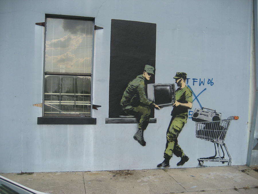 Banksy Looters In New Orleans Photograph by Arik Bennado
