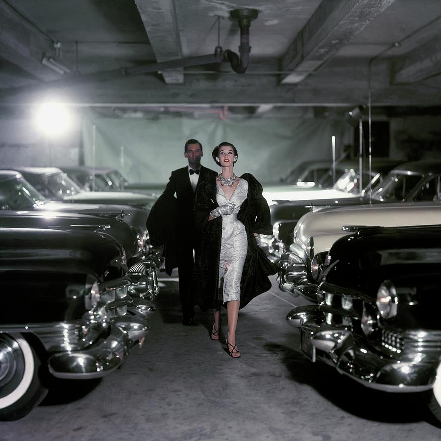 Fashion Photograph - Barbara Mullen With Cars by John Rawlings