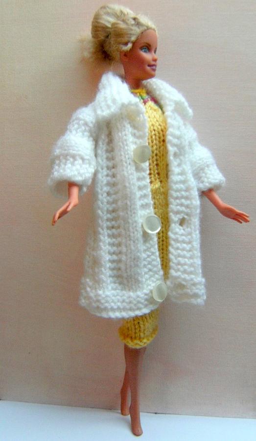 Barbie Doll In A Knitted Dress And Coat Photograph